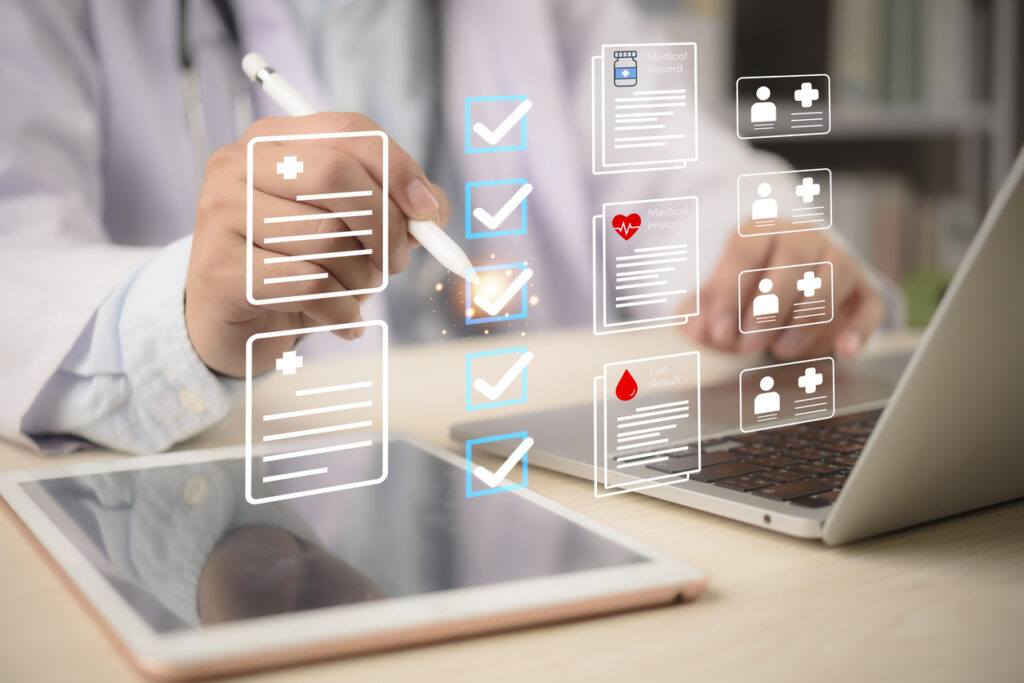 Checklist, doctor taps tablet beside laptop to review medical records and patient data privacy, ticking tasks across history, lab results, and profiles.